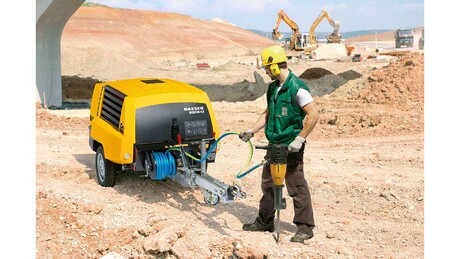 Mecanism de derulare furtun pentru compresoare pentru construcţii ca accesoriu